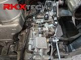 Audi R8 manual transmission conversion. Showing RKX wiring harness installed on a vehicle.